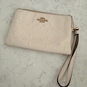 Coach Embossed Cream Wristlet